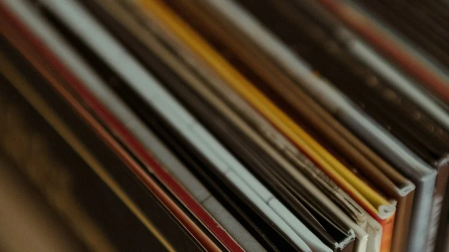 A row of record sleeves, viewed close and at an angle