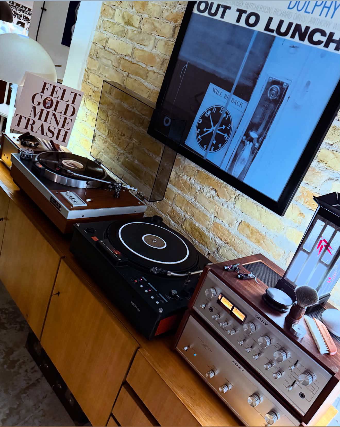 Sony receiver beneath a framed copy of Out to Lunch, Eric Dolphy