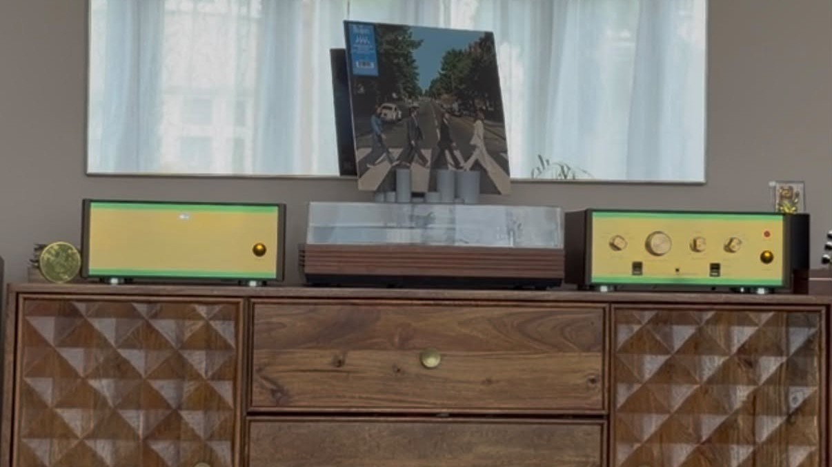 A record reflected in the mirror above the sideboard